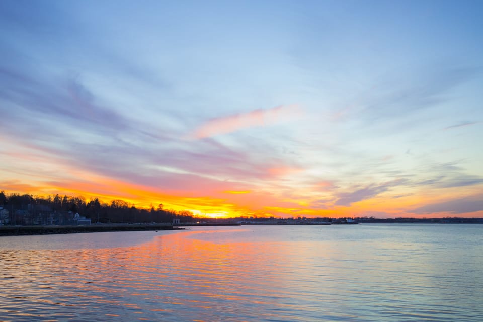Enjoy stunning sunsets from the bench on the harbor walk.