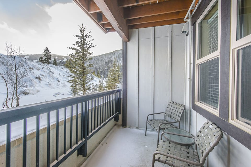 Private Balcony- - Offers seating and small table.