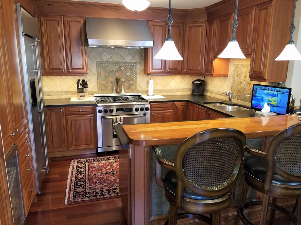 Dacor six burner gas range with an exhaust hood 