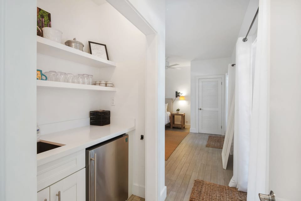 Wet bar and fridge between the king bedrooms for your convenience!