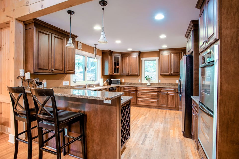 Spacious kitchen with bar