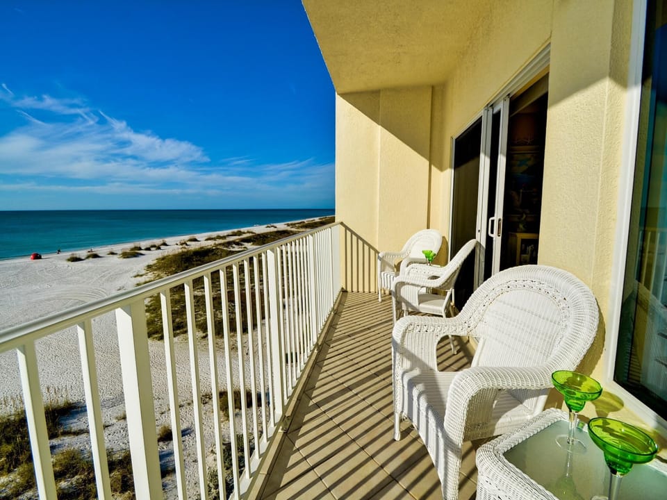 Beachfront balcony overlooking the sands