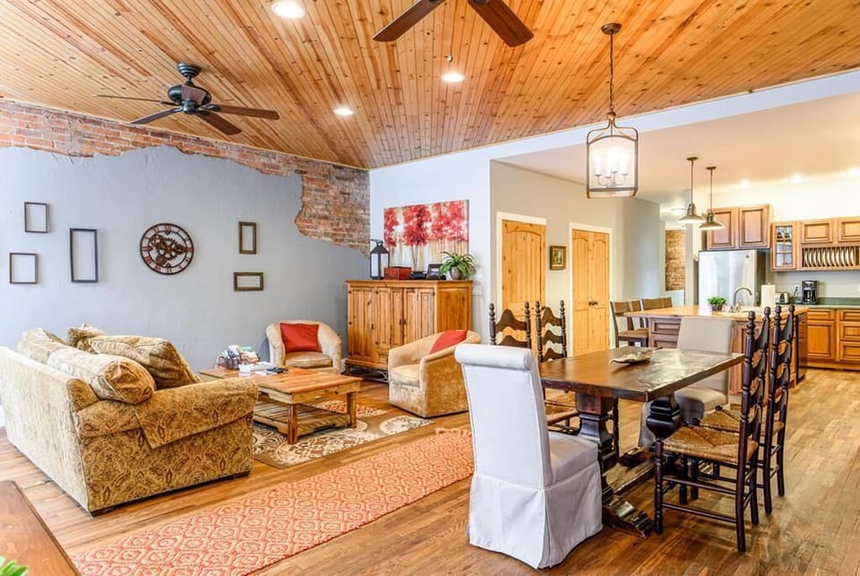 Attractive exposed brick and hardwood