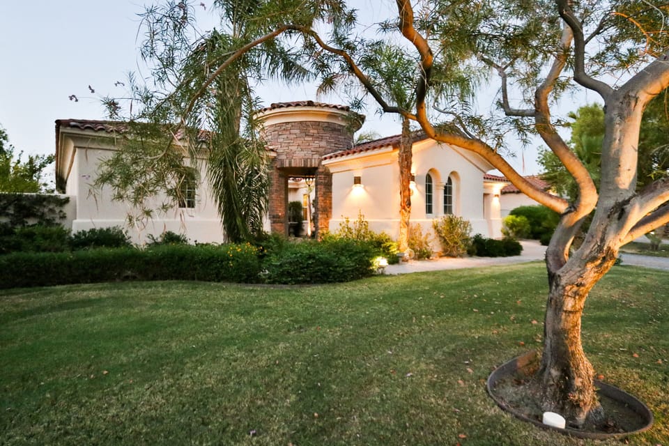 Main entrance with large two car garage