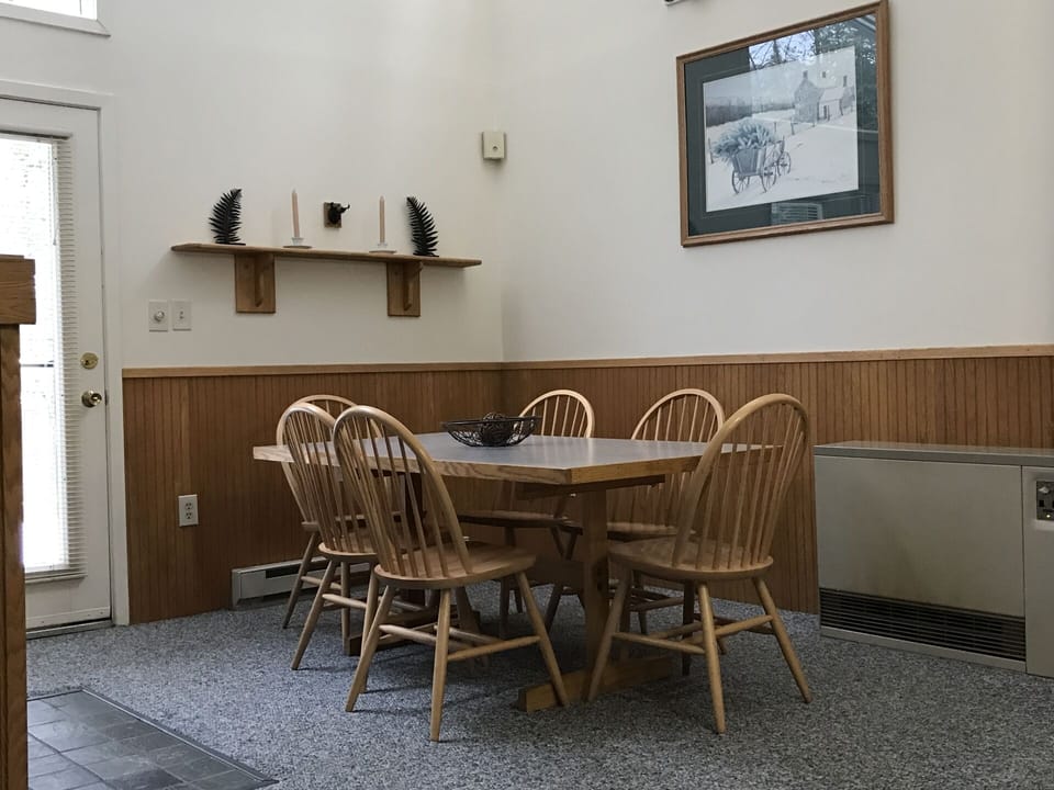 Dining Area with cathedral ceiling