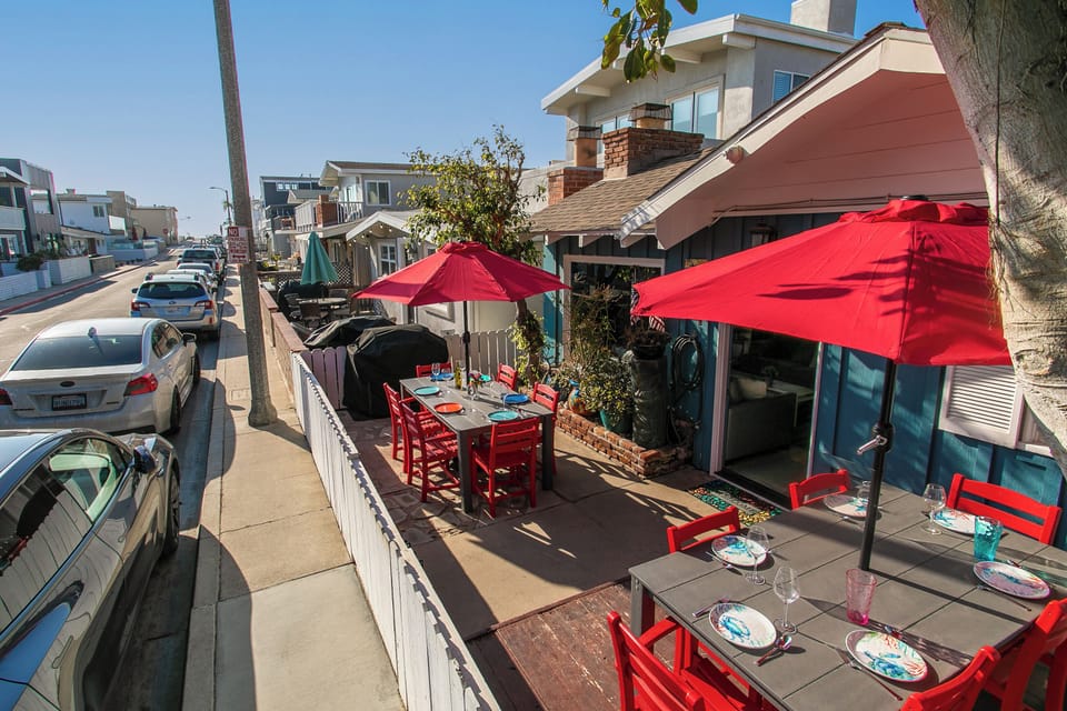 One minute walk to the beach!  Dining for six and a gas BBQ. Shared with the lower unit.  Each has its own BBQ and dining area.