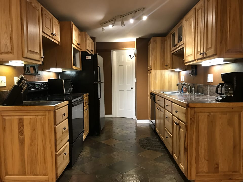 Functional Kitchen measuring 13’ x 9’.  