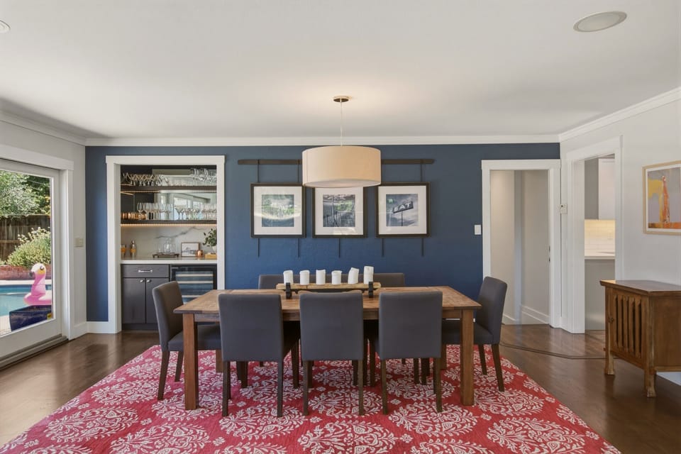 Dining room off of the kitchen with beautiful new bar, dining for 8, and views.