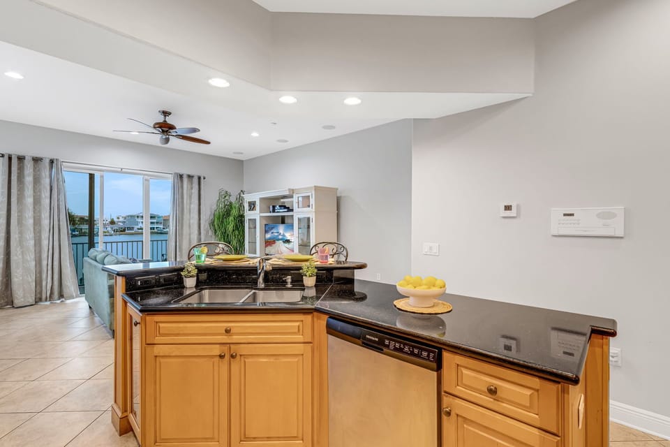 Gourmet Kitchen – Features a private balcony overlooking the water, perfect for morning coffee.