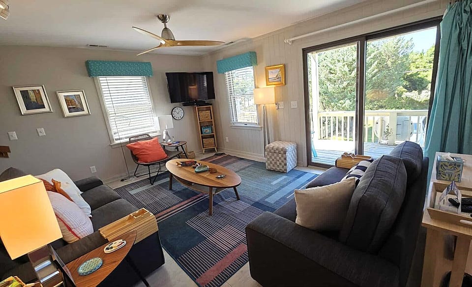 Living Area with, TV, First Floor with Deck Access