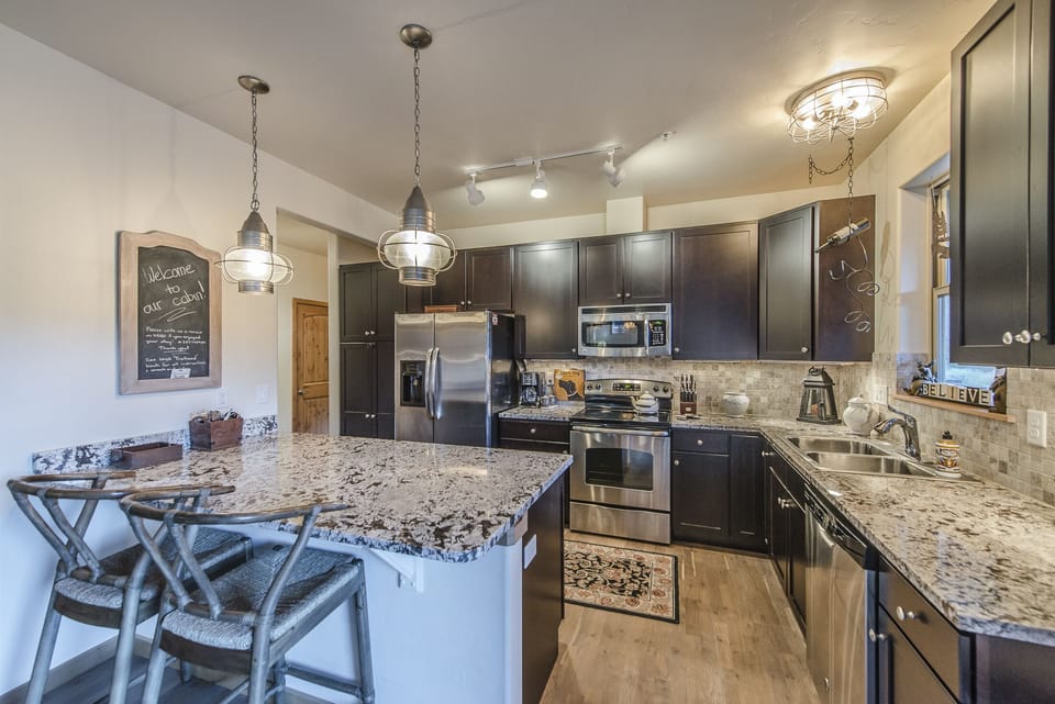 Kitchen - Kitchen-
Beautiful kitchen with stainless steel appliances, double sinks, and great counter space.