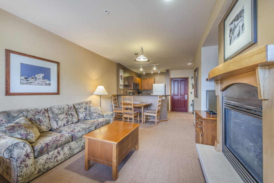 Living Area - Gas fireplace, and flat screen TV.