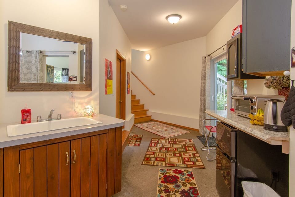 Hallway between kitchenette and upstairs rooms