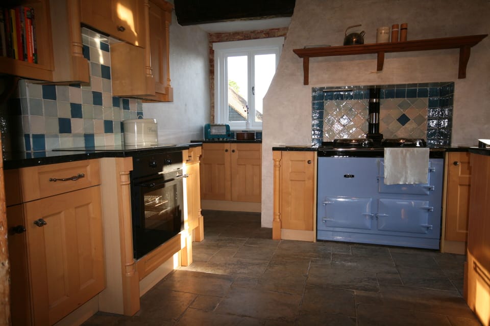 Well equipped kitchen with AGA and electric cooker, coffee machine, dishwasher