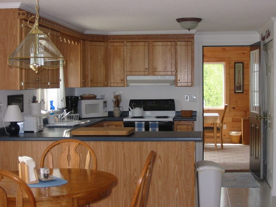 Kitchen and Dining Areas are Immaculate and Inviting!