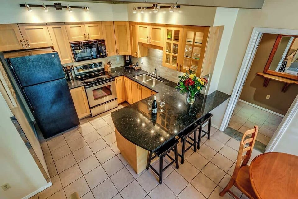 Full Kitchen view from stairs to loft