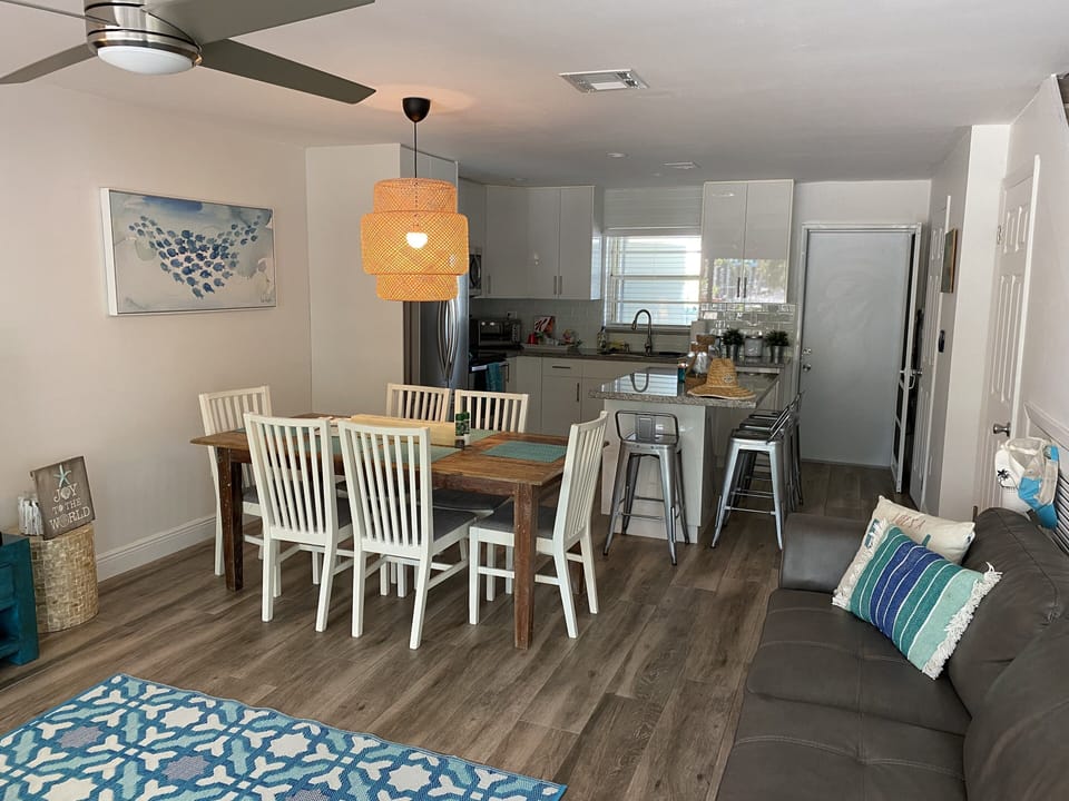 View of kitchen and dining area from living room. 
