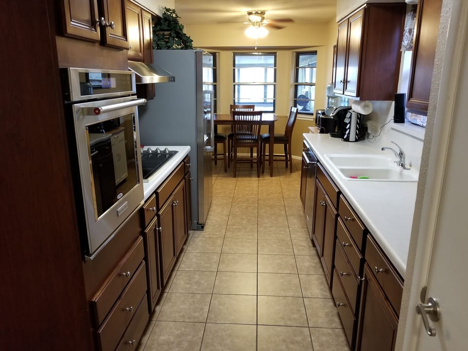KITCHEN WITH TOP OF THE LINE APPLIANCES