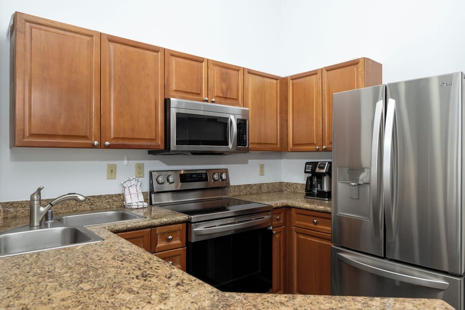 Kitchen - Kitchen with granite counter top and stainless steel appliances.