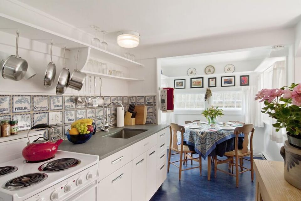 Well-equipped country kitchen with a sunny dining nook