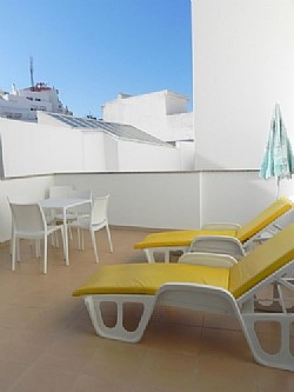 Outside terrace area shared with next door apartment