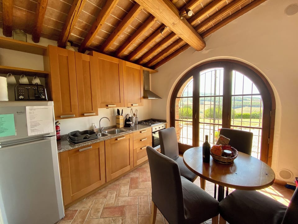 Fully fitted kitchen with view to east facing patio