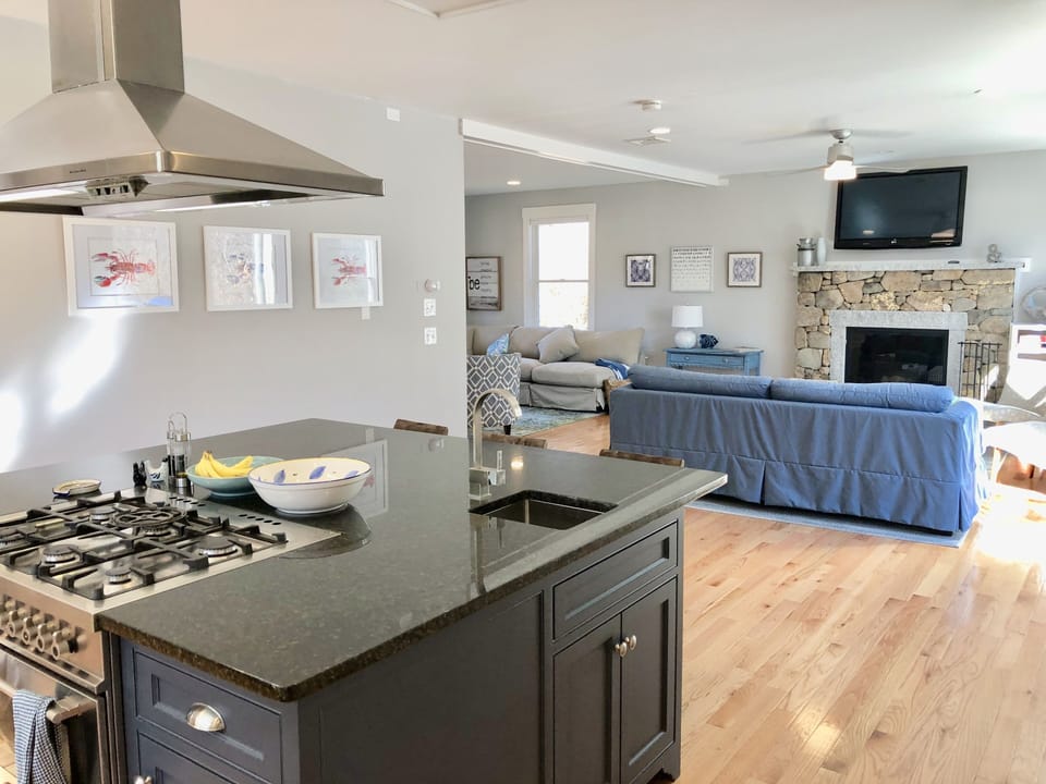The open concept first floor is conducive to hosting large groups