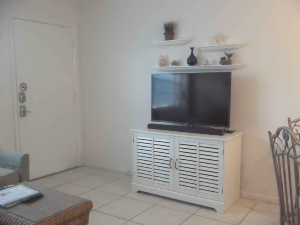 43" 4K UHD TV with Sound Bar, DVD Player, and over 50 DVDs