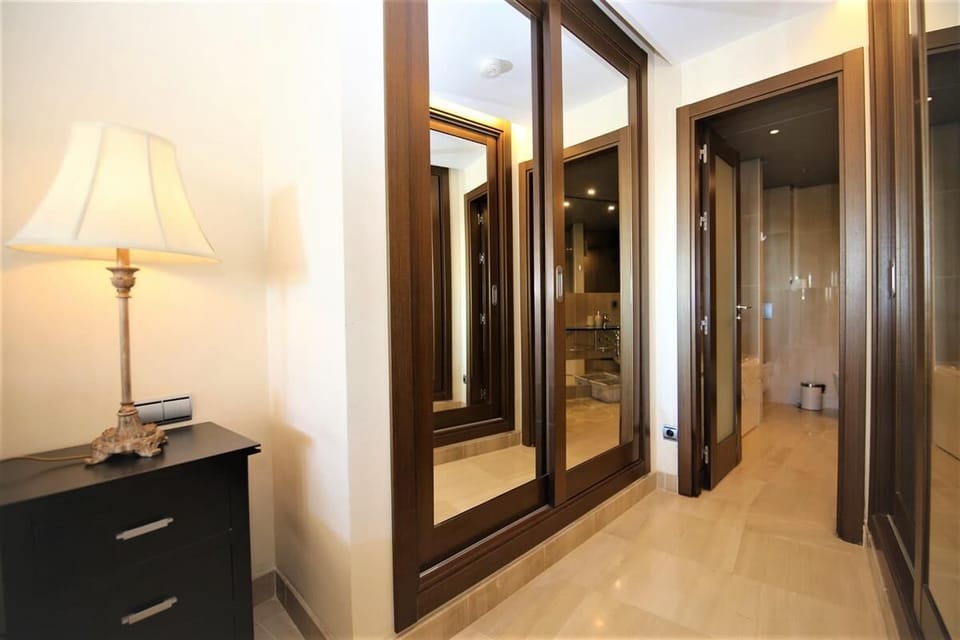 Master bedroom has lots of storage space in its built-in wardrobes