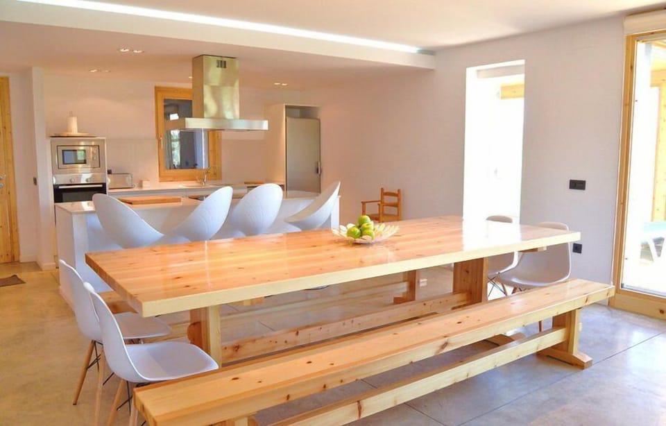The large, open and modern kitchen / dining area