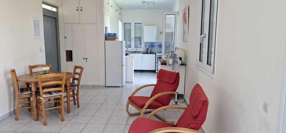 Total open plan living. Tables and chairs inside and on the terrace,  