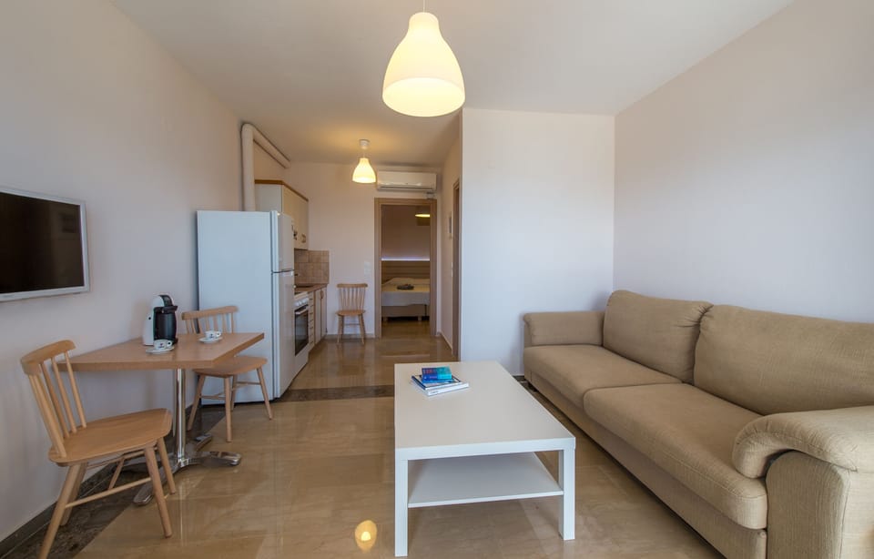 Ground floor Sea view apartment 41m2. Kitchen Area & Sofa /Extra Double Bed