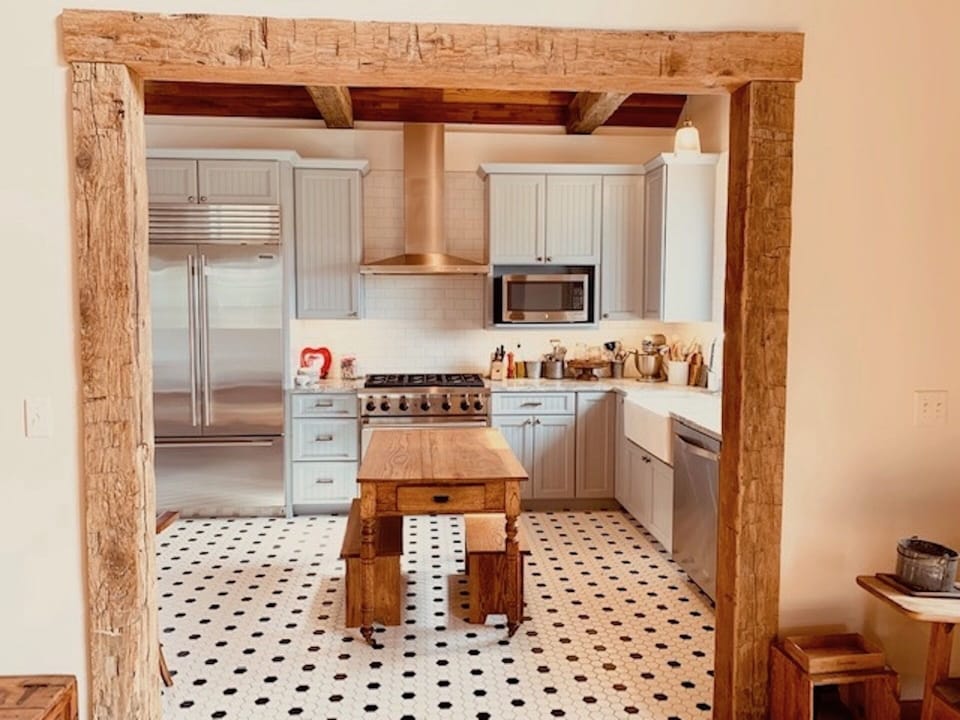 Huge kitchen with Subzero refrigerator and Wolfe range.