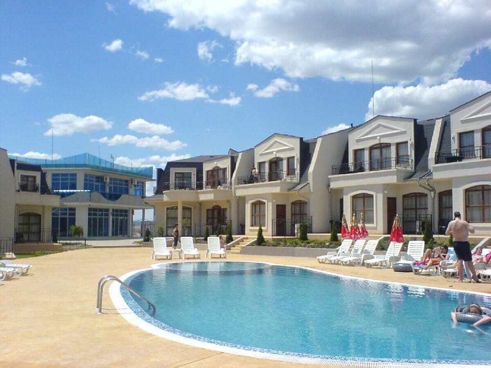 View of apartment and pool