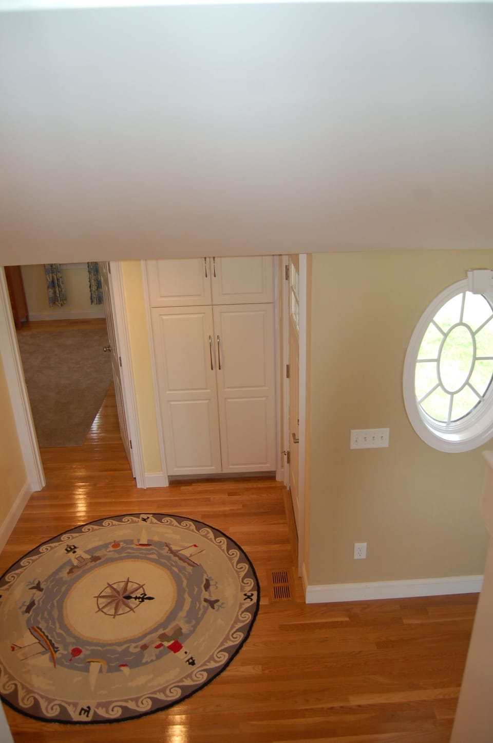 looking down staircase from second floor