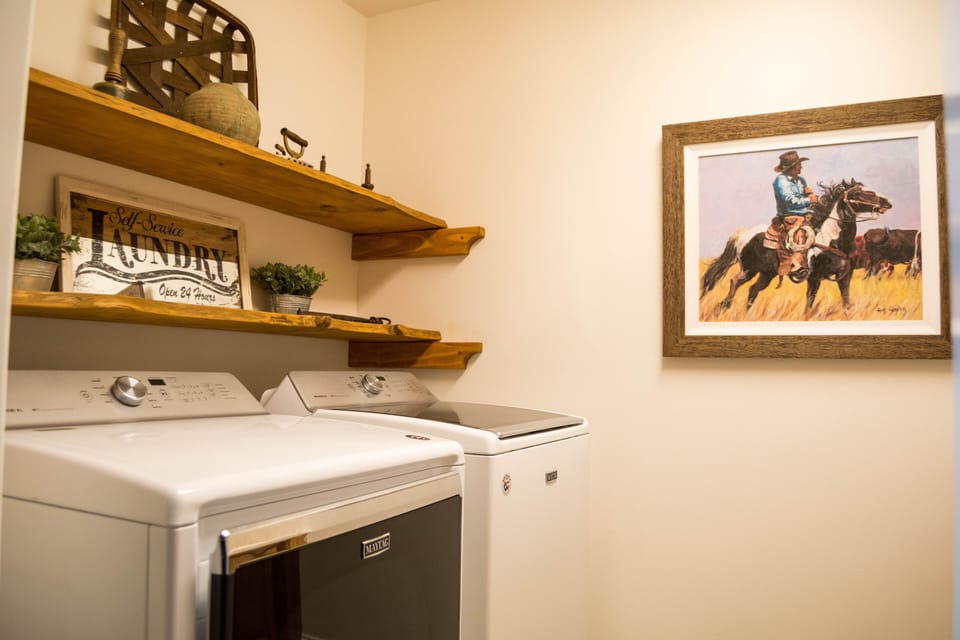 Laundry Room with complimentary detergent and dryer sheets.