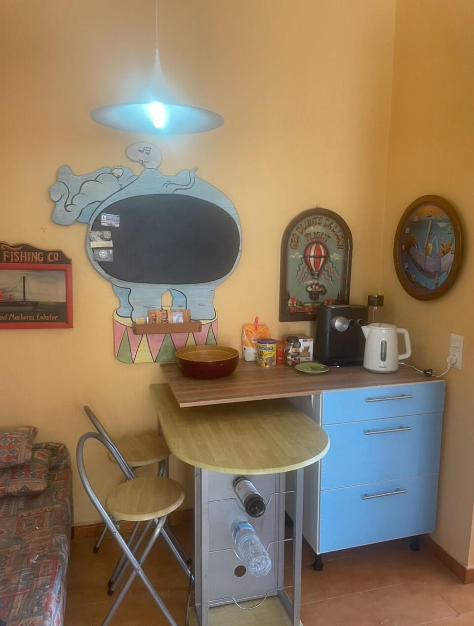 Beverage area within fully equipped kitchen.
