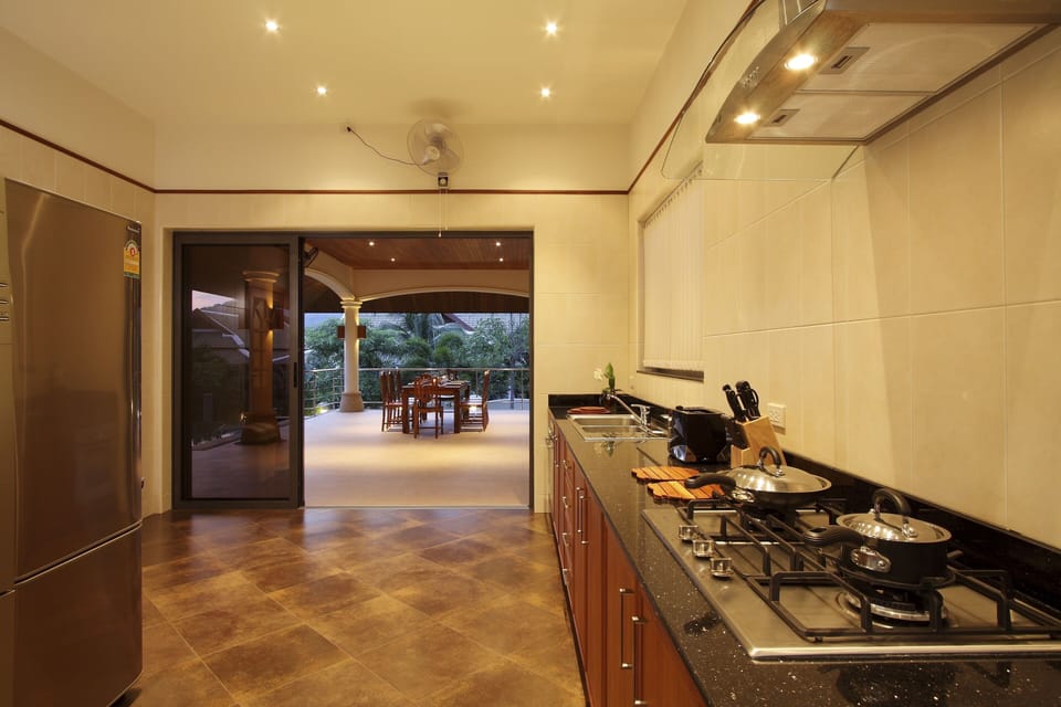 Kitchen opening onto the poolside.