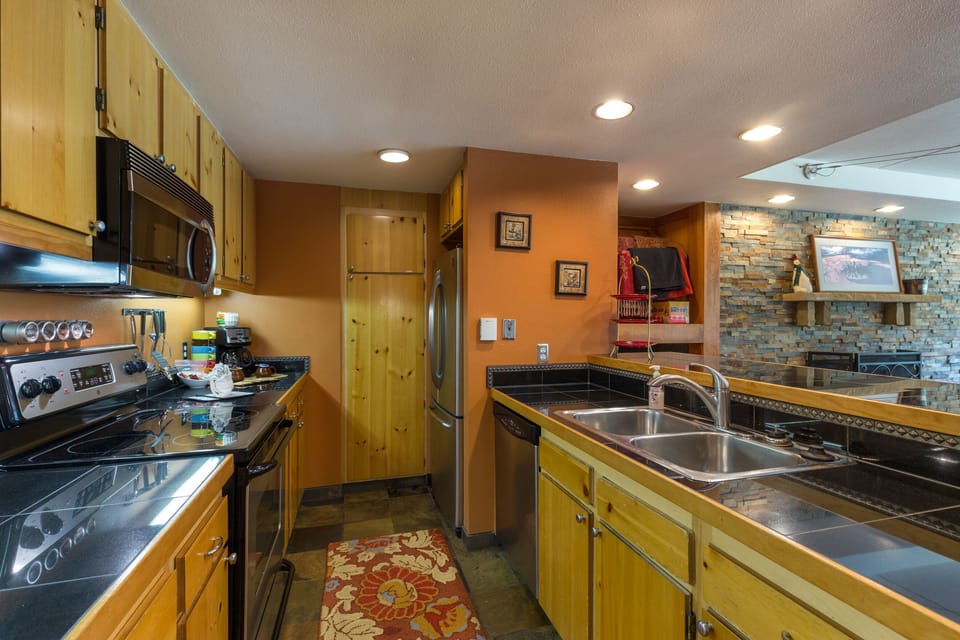 Kitchen well supplied with cookware and amenities for group and holiday meals!