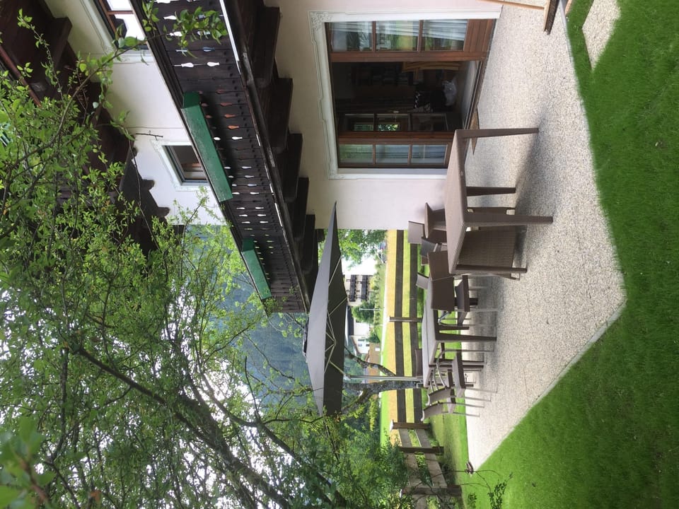 the dining room opens onto a large patio area