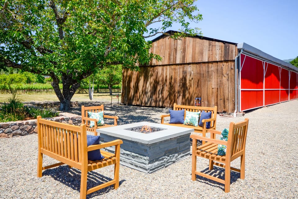 Fire pit, barn, and views of neighboring vineyards