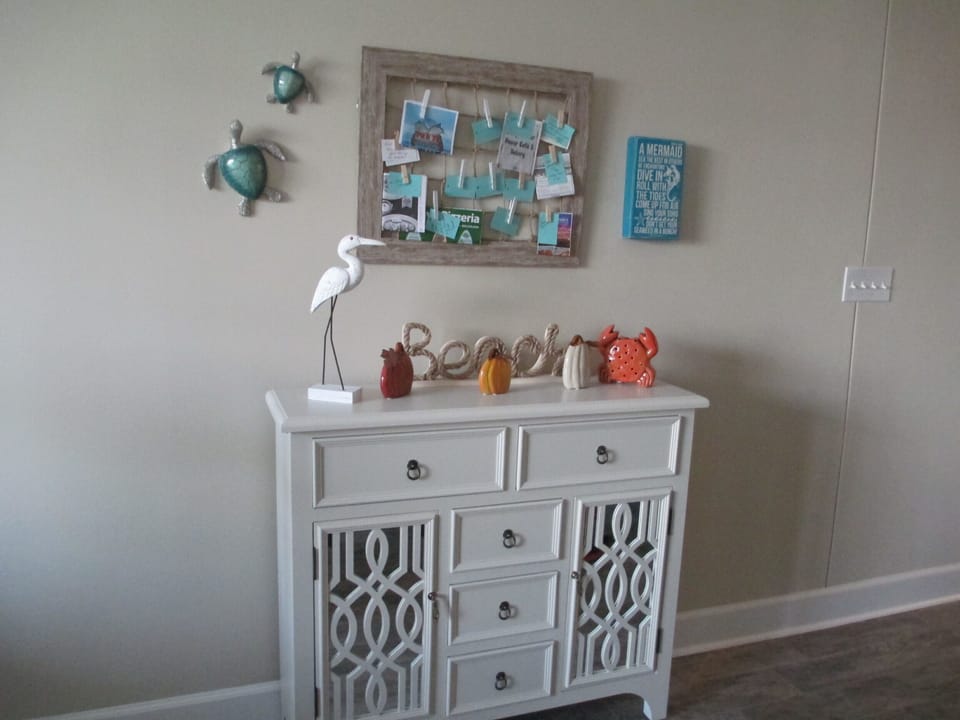 bar utensil cabinet, restaurant board, great dining close by 