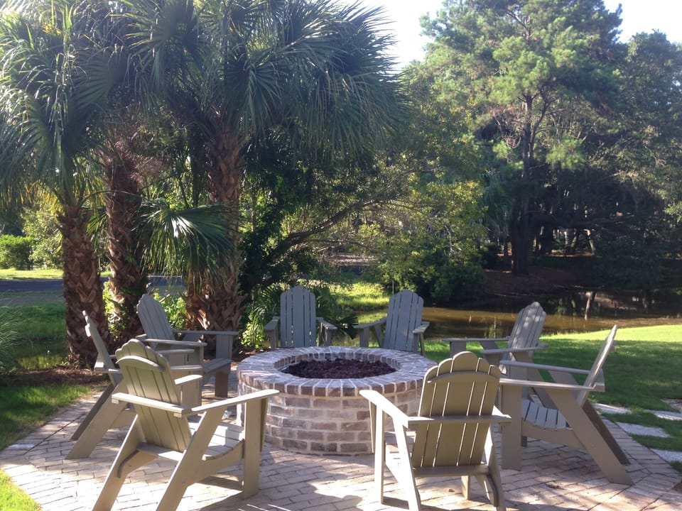 The new fire pit area next to the grills and pool are great for gatherings