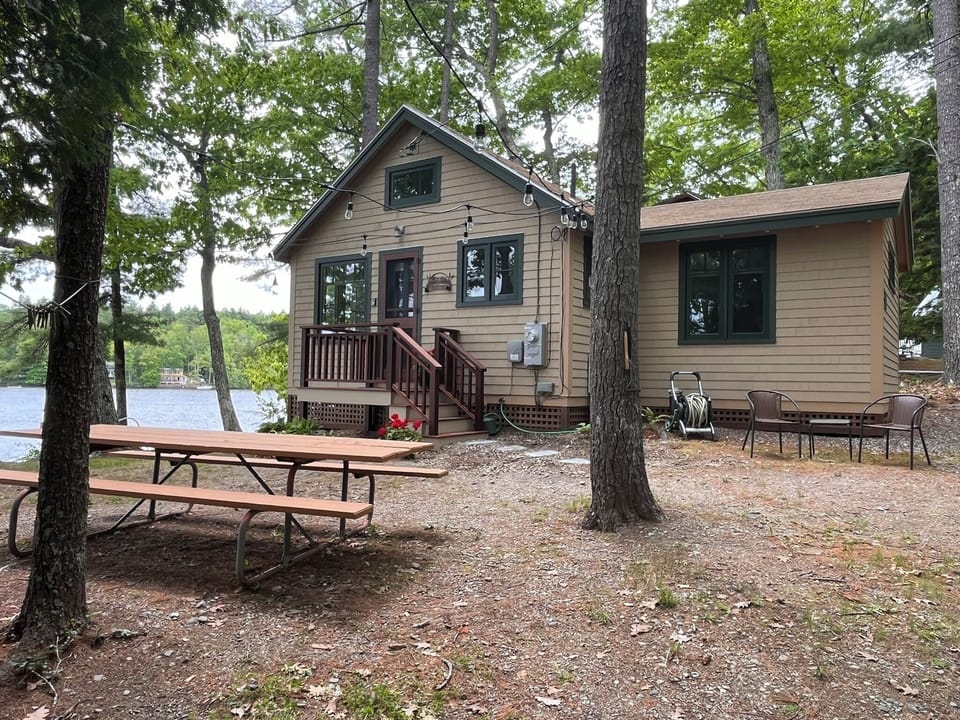 Outdoor gathering spaces overlooking Norton Pond.