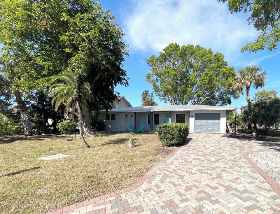 1/3 acre double lot with large parking area.  photo taken 12/8/24