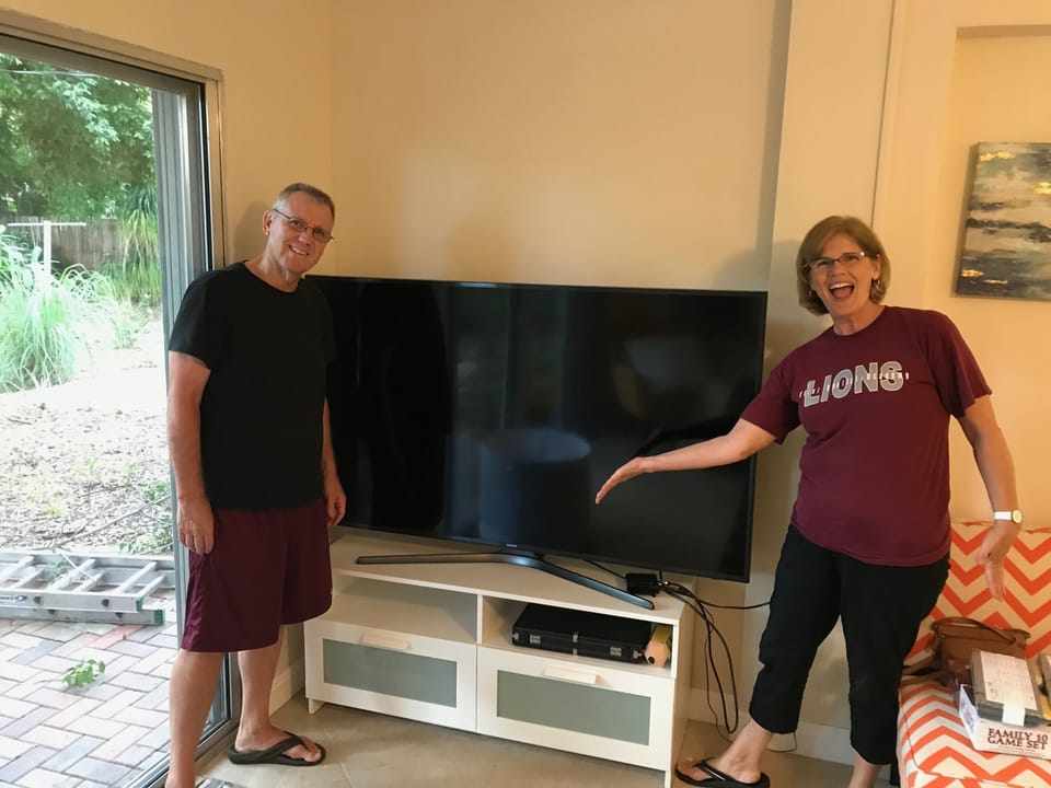 TV can been seen from Parkview & Living Rooms. Storage for DVDs & controllers.