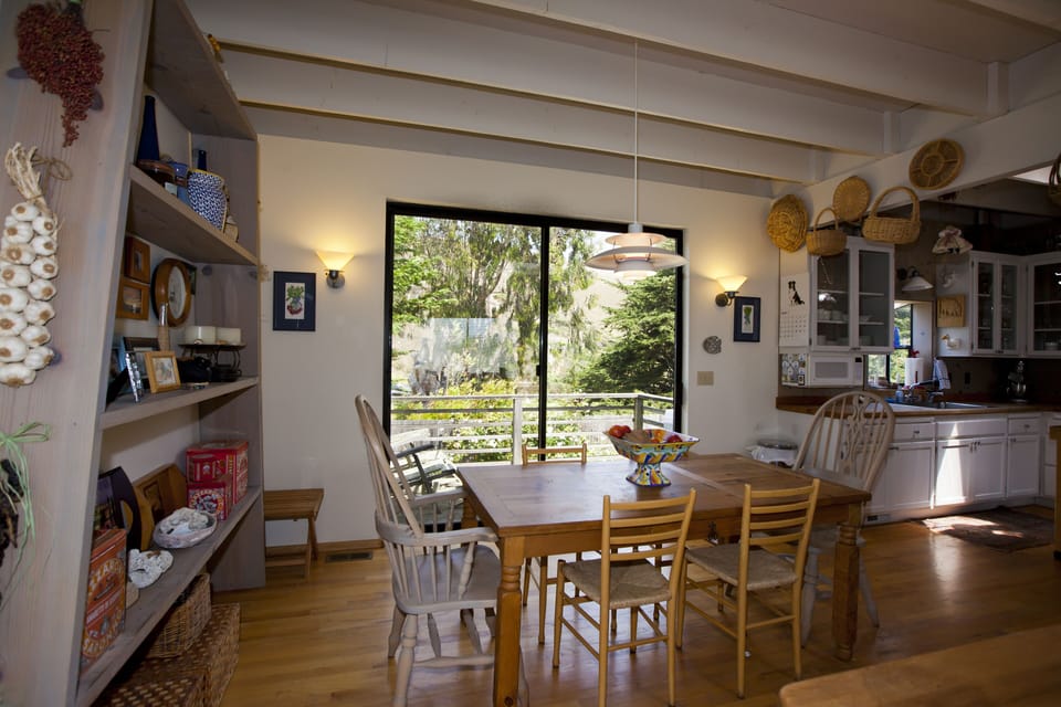Dining area opens to back deck