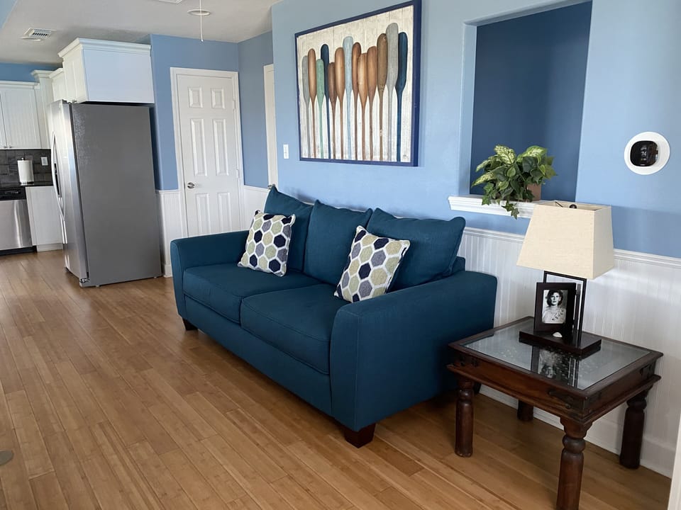Beautifully decorated living room with beach decor.