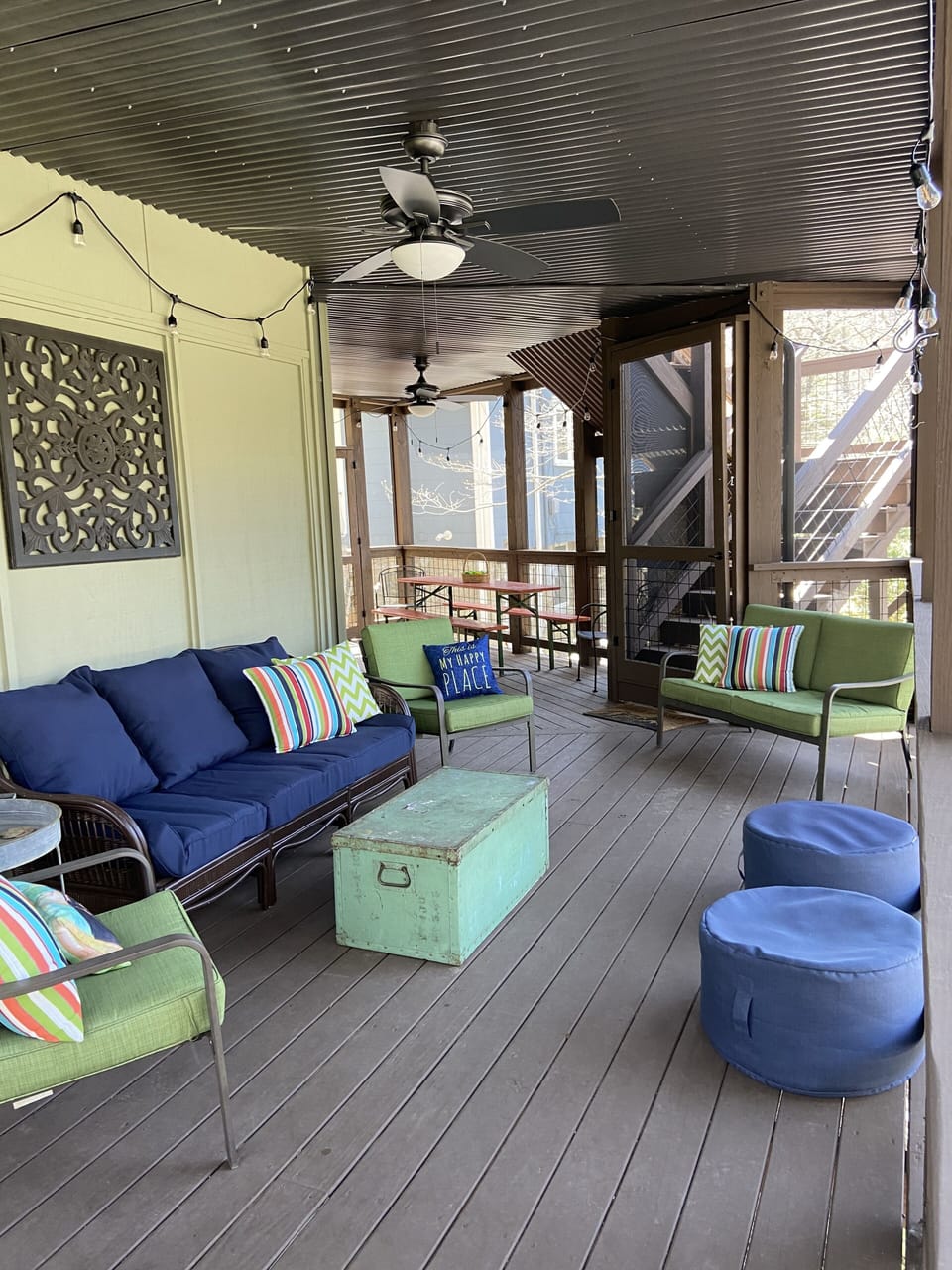 Huge screened porch with seating and large area for dining. 