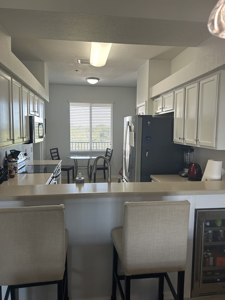 Kitchen w/ built in beverage fridge
